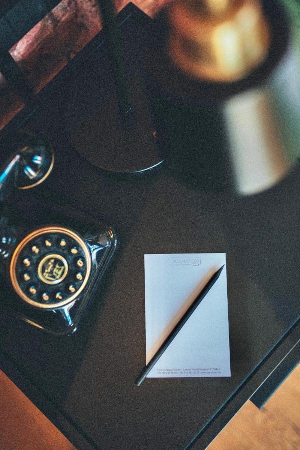 Ruz Hotels Istanbul Ngoại thất bức ảnh A telephone with a built-in memo pad